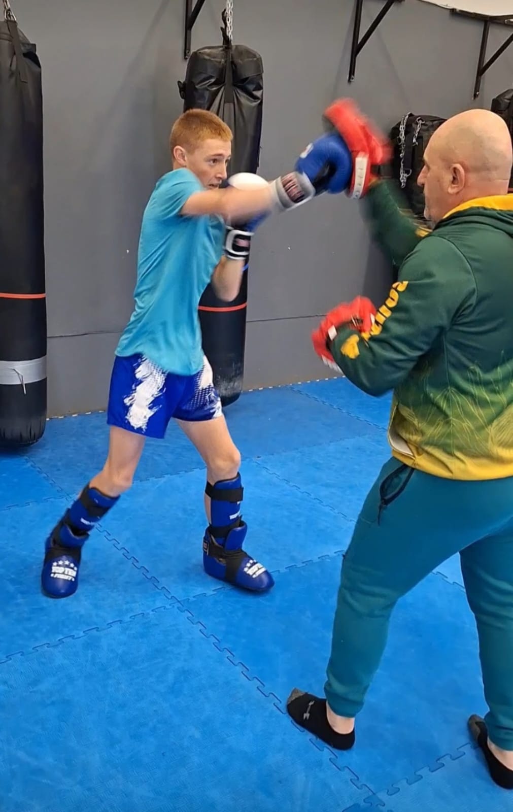 Joshua training with coach